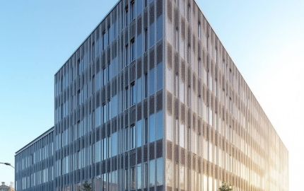Engineering the Aluminium Mesh Facade for Wind Load Coating and a Thirty Year Service Life